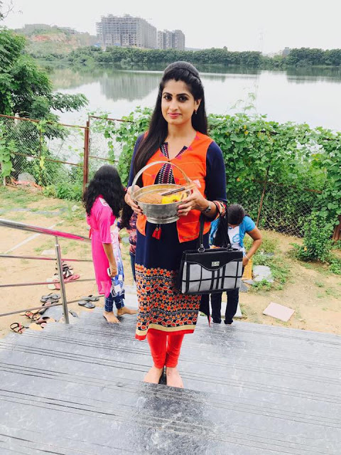 Telugu Serial Actress Chaitra Rai Stills In Orange Dress 14